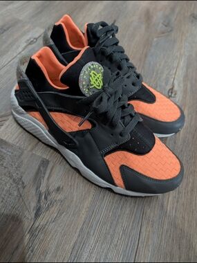 Nike Men's Black and Orange Running Sneakers with Neon Accent